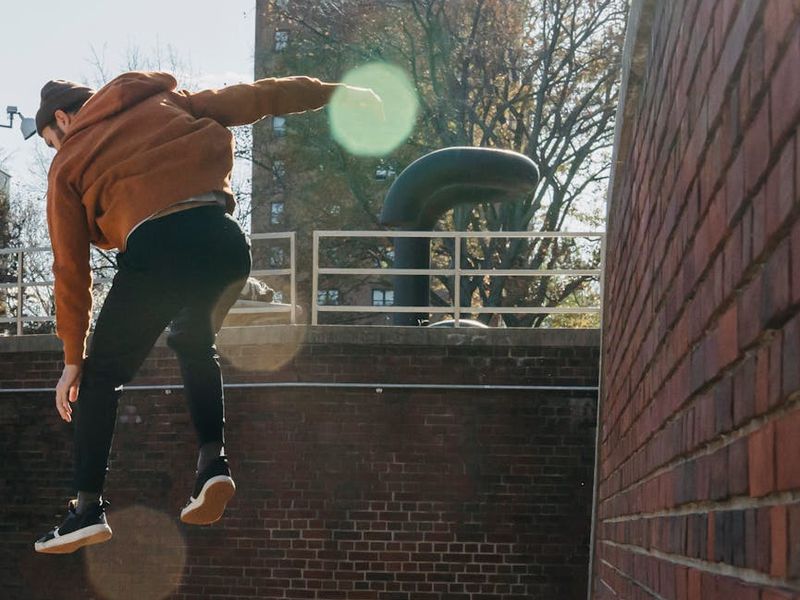 Person in mid-motion during a fluid exercise, showing energy.