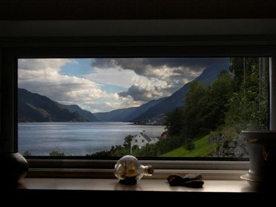View of a serene landscape from a window, symbolizing peace of mind.